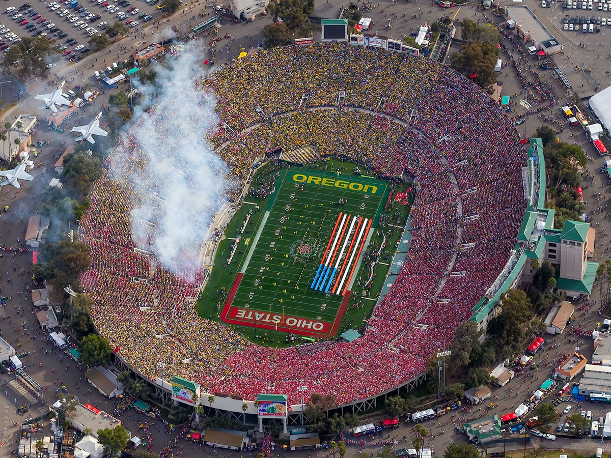 Blog aerial image of 4 F-18s flying over the 2010 Rose Bowl Game at the conclusion of the National Anthem in Pasadena, California