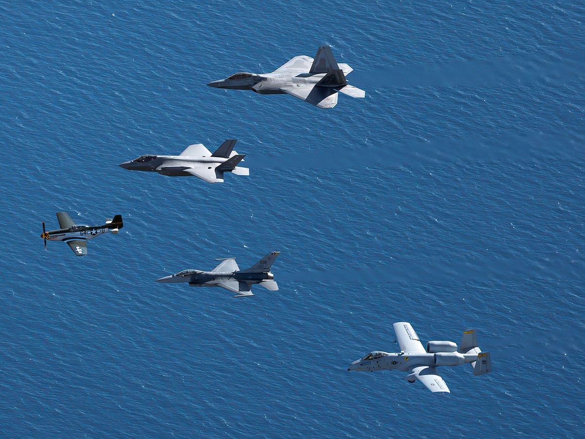 Blog photograph of the Air Force Heritage Flight, comprised of an F-22, F-35, P-51, F-16 and A-10 flying in formation over the ocean off Malibu, California