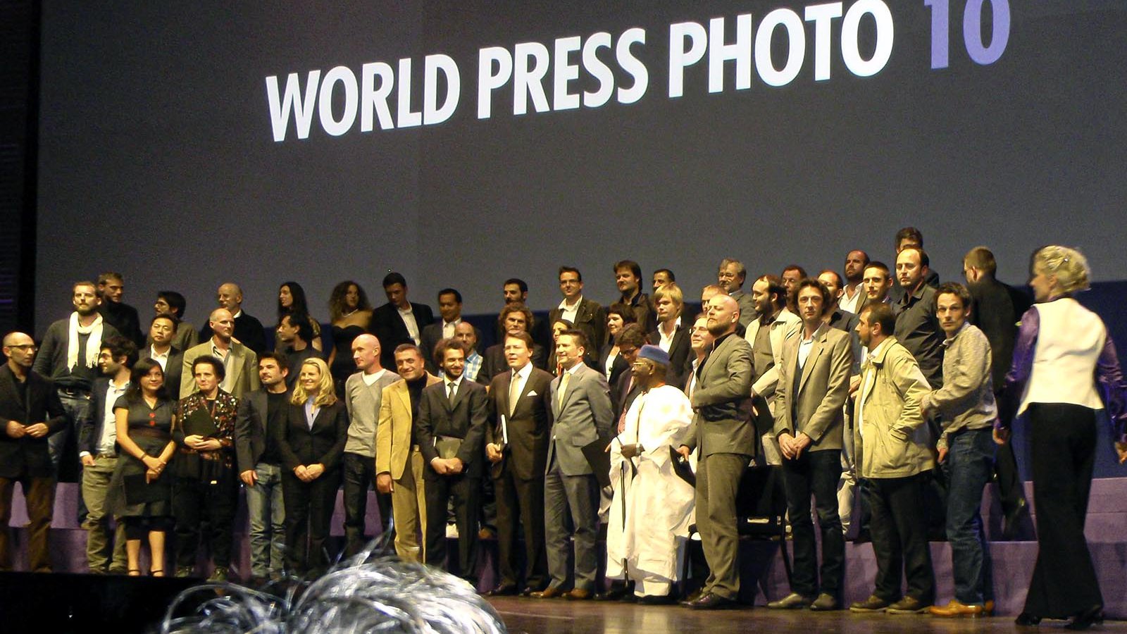 Press photo of Mark Holtzman and other World Press Photo Award Winners at the 2010 Awards Ceremony in Amsterdam