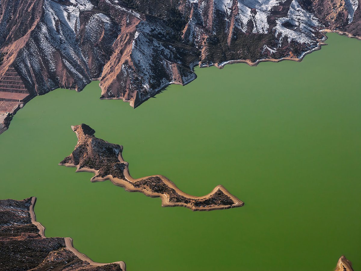 Blog image of Pyramid Lake with green opaque water, located just north of the San Fernando Valley in California