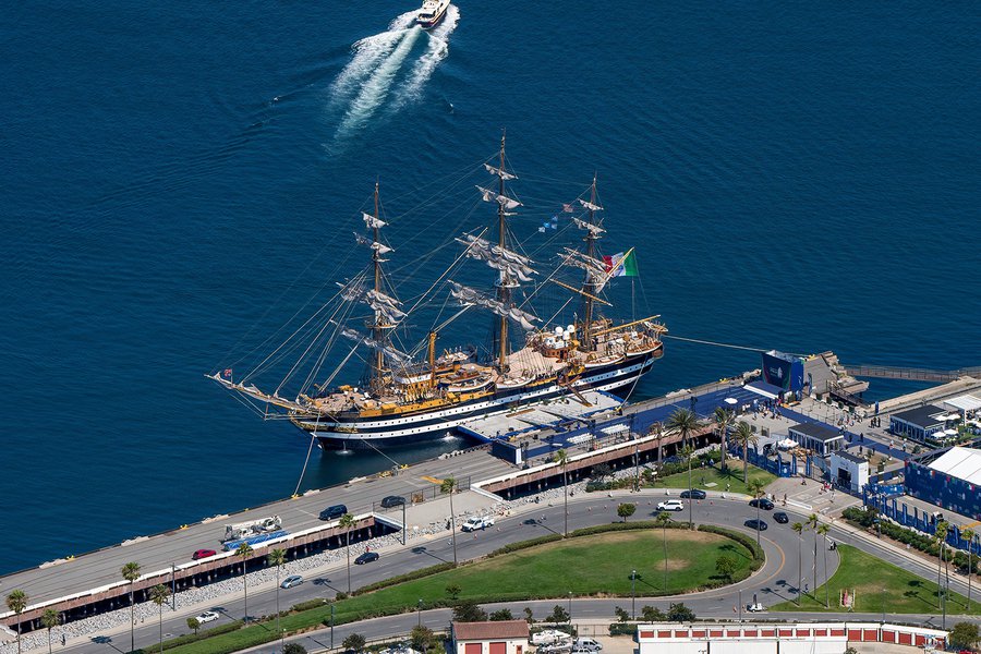 Aerial view of the Amerigo Vespucci docked at the bustling Port of Los Angeles.